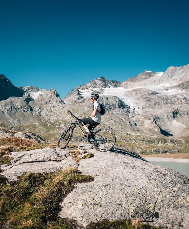 Mountain bike line through alpine terrain